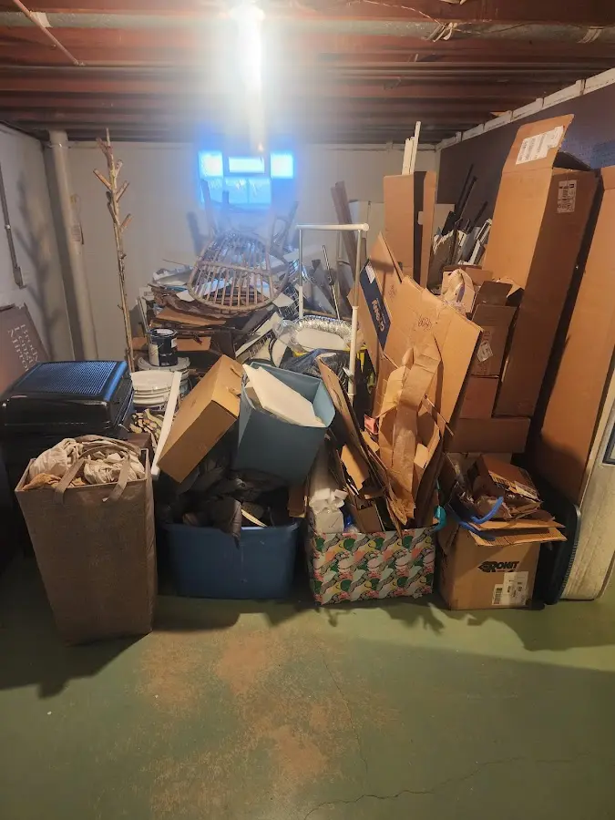 Roll-off dumpster container at job site for 2 Yard Dumpster Rental in Mendota